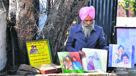 Jaspal Singh from Rajpura shows his collection of LP records of Chamkila's songs during Chamkila Mela at Dugri in Ludhiana on Friday. The music enthusiast has over 3,000 records of nearly 400 singers. Three hundred of these records are of Chamkila's songs. The oldest record dates back to 1933, made in Lahore.