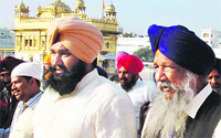 Animal Husbandry Minister Gulzar Singh Ranike (R) at the Golden Temple in Amritsar on Friday. Photo: Vishal Kumar
