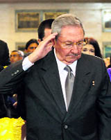 Cuba's President Raul Castro stands next to the coffin of Hugo Chavez in Caracas on Thursday.