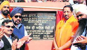 Punjab Industry Minister Anil Joshi (2nd from right) after laying a foundation stone at the Ranjit Avenue in Amritsar on Saturday.