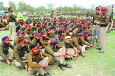 A large number of personnel being briefed ahead of the farmers dharna against the state government, at the Police Lines in Bathinda on Saturday.