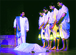 Artistes enact a play, “Jeevan aur Mritue”, at the Tagore Theatre, in Chandigarh on Saturday