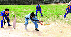 A visually impaired player hits a shot during the Cricket Tournament for Blind on the PU campus on Saturday