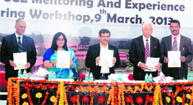 Chairman, CBSE, Vineet Joshi, along with other dignitaries, releases a souvenir at a workshop at Selaqui International School in Dehradun on Saturday.