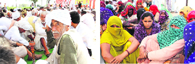 Jat activists sit on a dharna at Mayyar village in Hisar district on Saturday. Photos: Manoj Dhaka