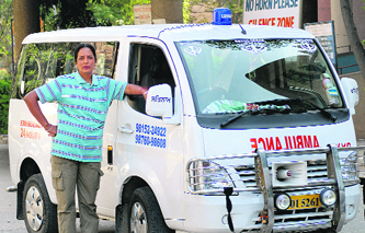 Manjit Kaur, who works as a private ambulance driver, in Jalandhar.