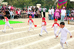 Kids perform during the sports day of nightingale pre-school in Channi Himmit, Jammu, on Saturday