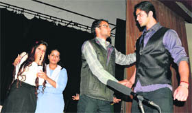 Students of the INIFD perform in a skit, Awaaz Do, on harassment faced by women, at Guru Nanak Bhavan on Saturday.