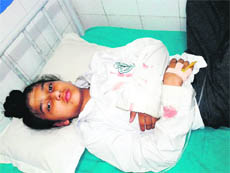 Adishwar Singh, a Class III student of Delhi Public School, at a hospital in Amritsar on Saturday.