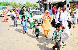 Barracading near the chowk left bus passengers inconvenienced as they had to walk their way to their destinations