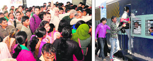 Passengers line up outside the ticket counters at the Chandigarh railway station; and (right) the lucky ones board the train to Haridwar on Sunday.