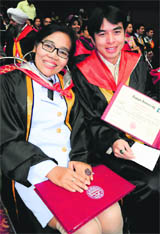 Sirijitti Pan Nger and Rachroat Punyaboon, students from Thailand, in a happy mood after receiving their degrees at the 62nd convocation of Panjab University in Chandigarh on Sunday.