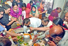 Devotees worship Lord Shiva on the occasion of Maha Shivratri in New Delhi on Sunday