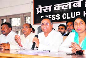 City Congress chief OP Chauhan with district womens working committee chief Kiran Singh in Haridwar on Sunday