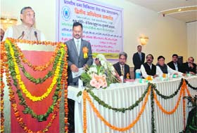 Chief Minister Vijay Bahguna addresses a convention in Dehradun on Sunday