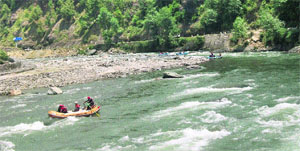 Rafts operating in the Beas from Babeli to Devdham upstream Kullu town.