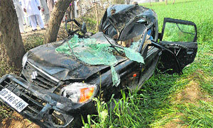 The mangled remains of a car after it hit a tree near Kalanwali in Sirsa on Saturday night. 