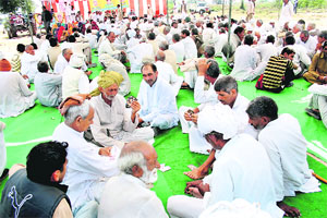 Activists of the All-India Jat Aarakshan Sangharsh Samiti play cards at the dharna site in Mayyar (Hisar) on Sunday. 