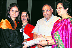 BJP MP Avinash Rai Khanna and college principal Rekha Kalia Bhardwai, awards degree to a student of HMV College during the annual convocation held in Jalandhar on Sunday
