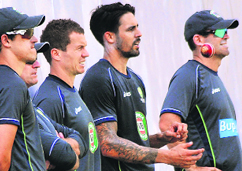 Coach Mickey Arthur, Mitchell Johnson, Peter Siddle and team members in Mohali.
