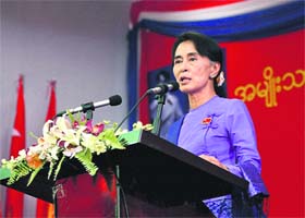 Myanmars Opposition leader Aung San Suu Kyi speaks at the congress of her National League for Democracy party in Yangon on Sunday