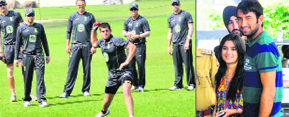 Australian cricket team players during a practice session; and (right) Indian cricketer Cheteshwar Pujara along with his wife at JW Marriott hotel in Chandigarh on Monday.