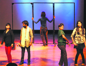 Artistes from Haryana enact a scene from the play "Kaal Kothry" at the Tagore Theatre in Chandigarh on Monday. 