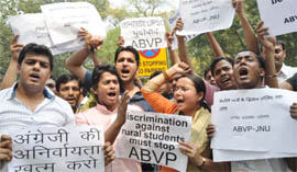 ABVP activists shout slogans in front of the UPSC building during a protest against various issues of Civil Services Exams (Main) in New Delhi on Monday.