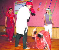 NSS volunteers present a cultural programme at Guru Jambeshwar University of Science and Technology in Hisar on the occasion of the International Womens Day. 
