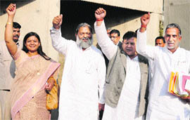BJP legislators protest outside the Haryana Vidhan Sabha in Chandigarh on Monday.