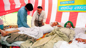 Doctors examine fasting Jat activists at Mayyar in Hisar.