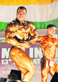 Amit Chhetri showcases his physique during Mr India-13th Federation Cup in Jalandhar on Monday.