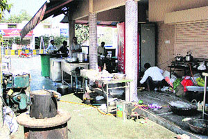 Burning tandoors and an electric generator set lying on a land encroached by a dhaba owner in PUDA Complex along the Laddowall road in Jalandhar.