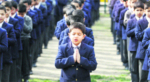 Students of Burn Hall School attend morning assembly in Srinagar on Monday. 