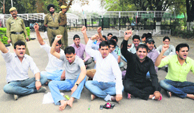 Members of INSO hold a protest at Panjab University, Chandigarh, on Tuesday.