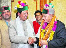 Chief Minister Virbhadra Singh congratulates Jagat Singh Negi after the latters assuming charge as Deputy Speaker in Shimla on Tuesday.