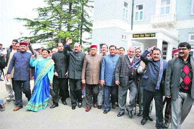 BJP legislators stage a walkout on the first day of the Budget session of the Assembly in Shimla on Tuesday.