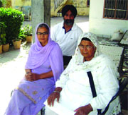 Tejinder Singhs wife Sukhwinder Kaur (left), mother Surinder Kaur and brother Jagroop Singh at their residence in Sunam on Tuesday. 