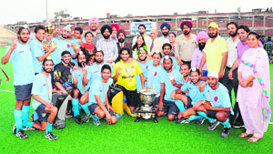 The team of Guru Nanak Dev University that won the overall trophy at the All-India Inter University Hockey Championship in Amritsar on Wednesday.