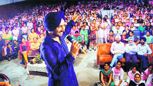 Punjabi singer Satinder Sartaj perfoms at Saroop Rani Girls Government College in Amritsar on Wednesday. 