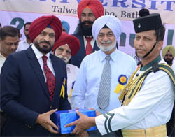 IG, Bathinda Zone, NS Dhillon  gives away a memento to a member of Garhwal Rifles.