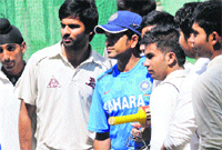 Star batsman Sachin Tendulkar with the young cricketers at the PCA Stadium, Mohali,on Wednesday. Tribune Photo: Vicky Gharu