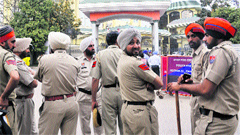 Policemen stand outside the stadium. India will play Australia in the third test matchfromtomorrow. Tribune Photo: Vicky Gharu