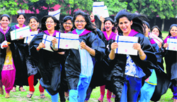 Students in a jubilant mood after receiving their degrees during the annual convocation at Post Graduate Government College for Girls, Sector 42, in Chandigarh on Wednesday. Tribune Photo: S.Chandan