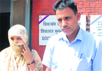 Victim, Amandeep Kaur, comes out of the police station at Mansa Devi Complex in Panchkula.