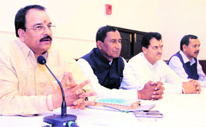 Ajay Bhatt, Leader of the Opposition in the Uttarakhand Assembly (left), addresses a press conference in Dehradun on Wednesday. 