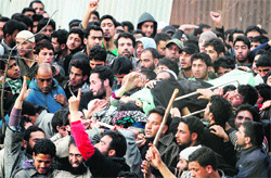 The body of Altaf Ahmad Wani being carried in downtown Srinagar on Wednesday. Tribune photo: Amin War