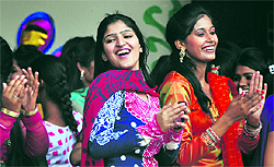 Girls dance during a farewell party at the Master Tara Singh Memorial College for Women in Ludhiana