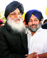 Chief Minister Parkash Singh Badal and Deputy Chief Minister Sukhbir Badal share a happy moment.