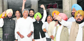 Congress MLAs, led by Sunil Jakhar (second from left), raise slogans at the Vidhan Sabha in Chandigarh on Wednesday.